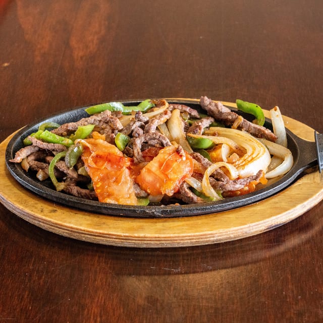 Steak or Grilled Chicken Fajitas.
