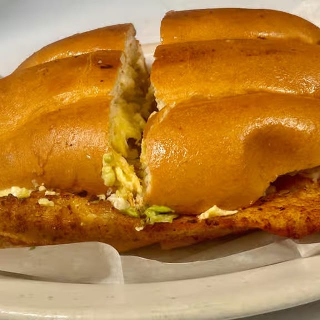 Torta De Milanesa (Breaded Steak or Chicken) Sandwich.
